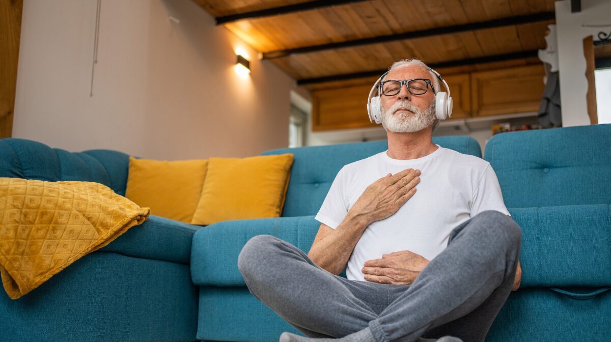 Man practicing mindfulness for caregivers at home.