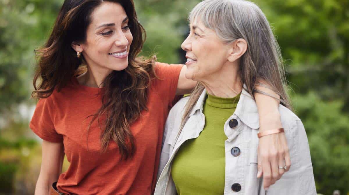Women discussing self-care for caregivers.