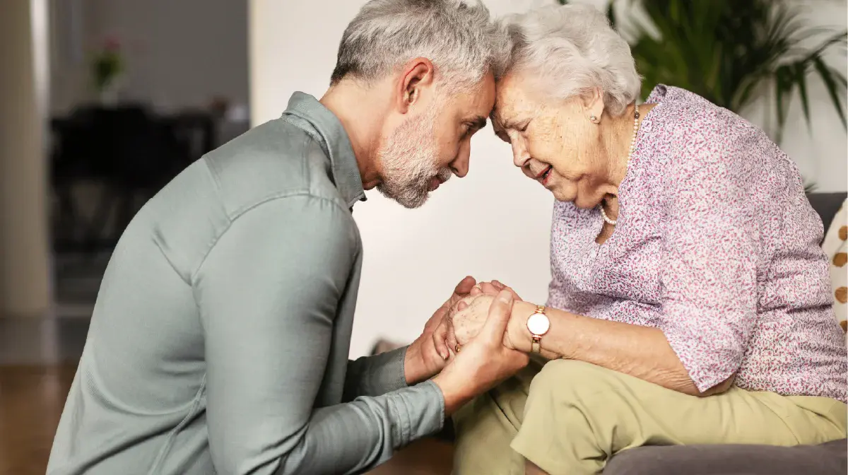 Mother and son discussing complex care.