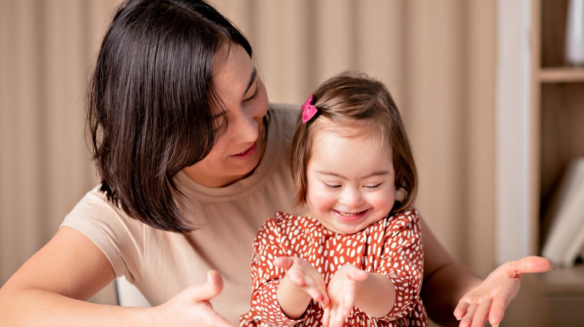 Mother and her young daughter enjoying their time together at home.