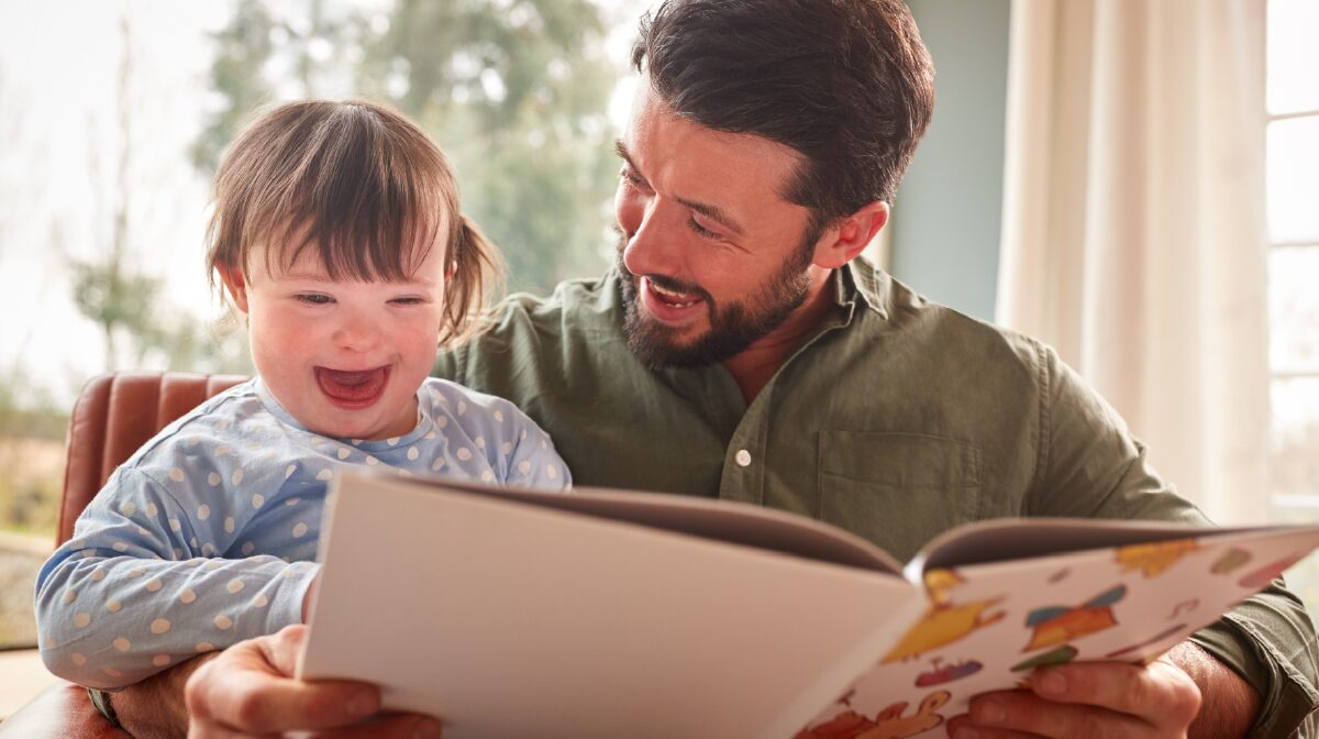 Father navigating neurodivergent care of his young son at home.