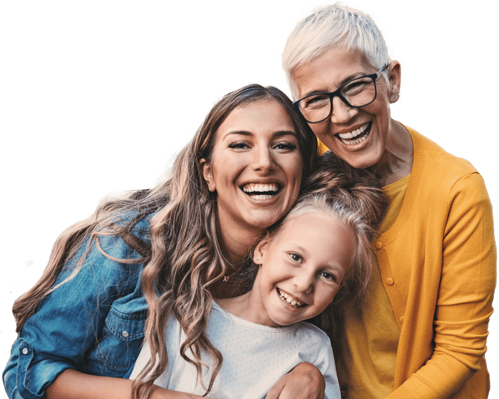 Multigenerational family hugging each other and smiling.