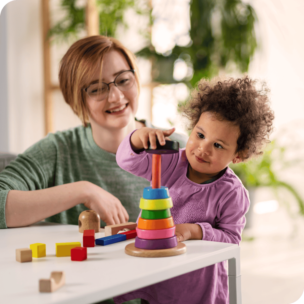 Mother and child playing games together.