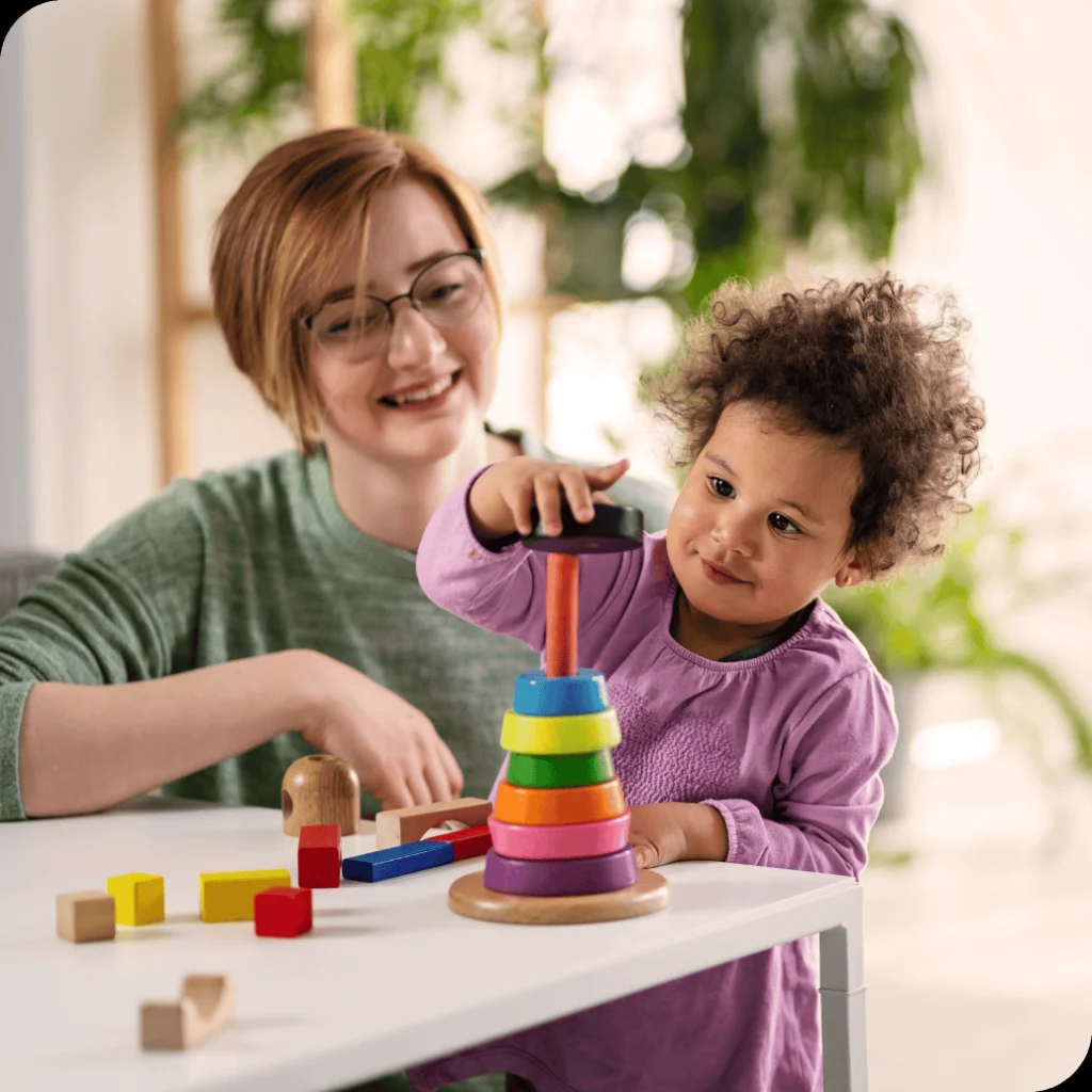 Mother and child playing games together.