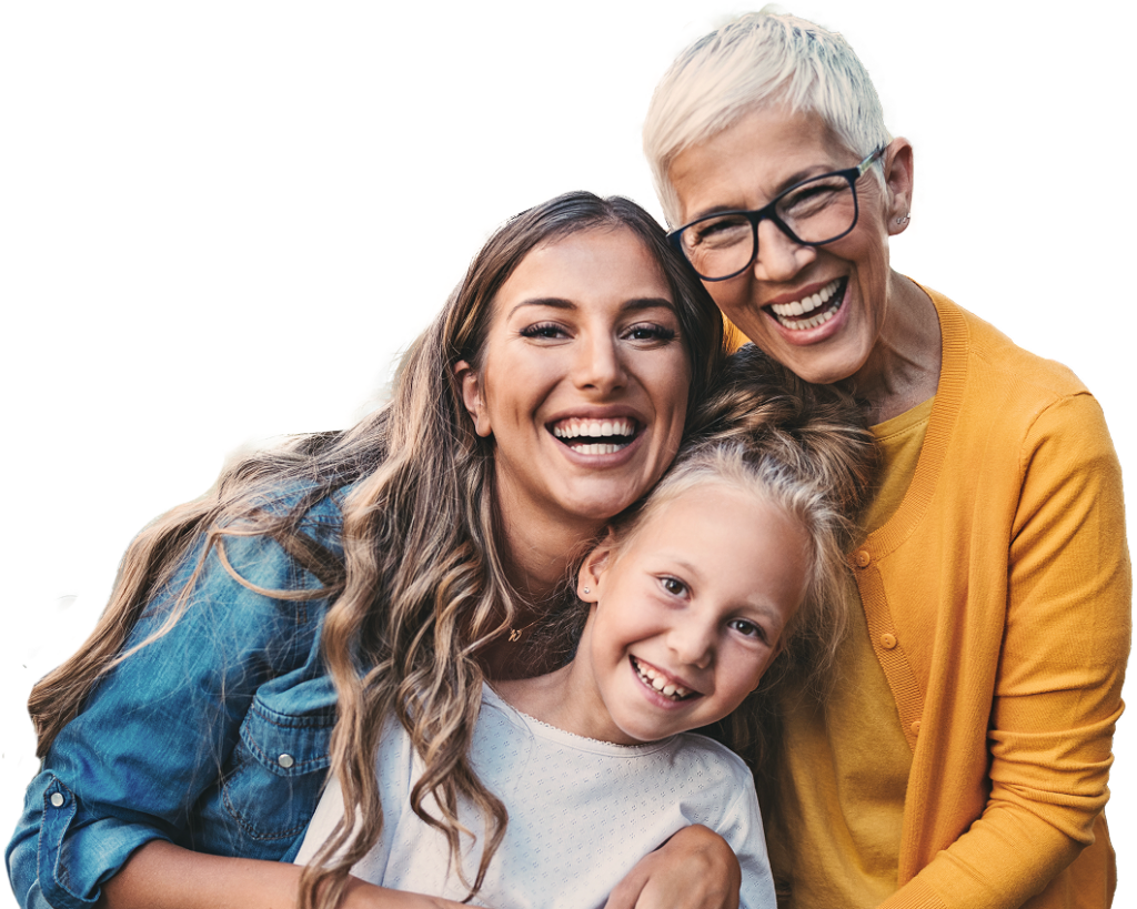 Multigenerational family hugging each other and smiling.